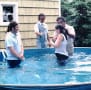 Baptism at Gerald & Ruth Rasmussen's in rural Moorhead June 1979 - Ralph and Gail Hennebry being baptized