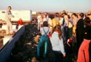 Bruce Young and congregation at groundbreaking service for new building in rural south Fargo - SE corner of building looking east June 1979